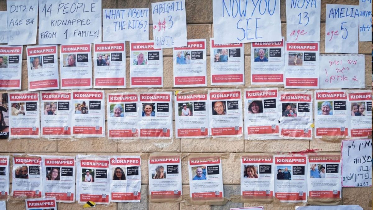 Flyers posted by families of Israelis held hostage by Hamas in Gaza as part of a protest outside the Israeli Defense Ministry in Tel Aviv. Oct. 14, 2023. 