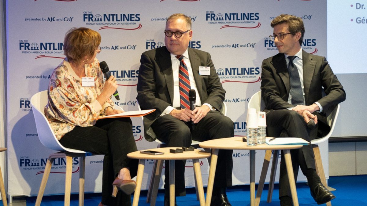 From Left: Géraldine Woessner, editor-in-chief of the French news magazine Le Point, Washington University Chancellor Andrew D. Martin and 
M. Luis Vassy, president of Sciences Po.

